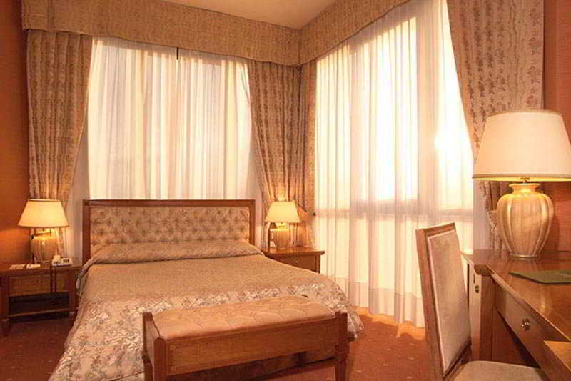 Room
Room
di Borgo Palace Hotel