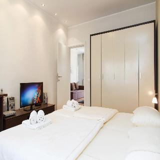 Room
Room
di Central Square Apartment