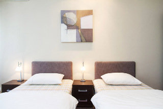 Room
Room
di Central Square Apartment