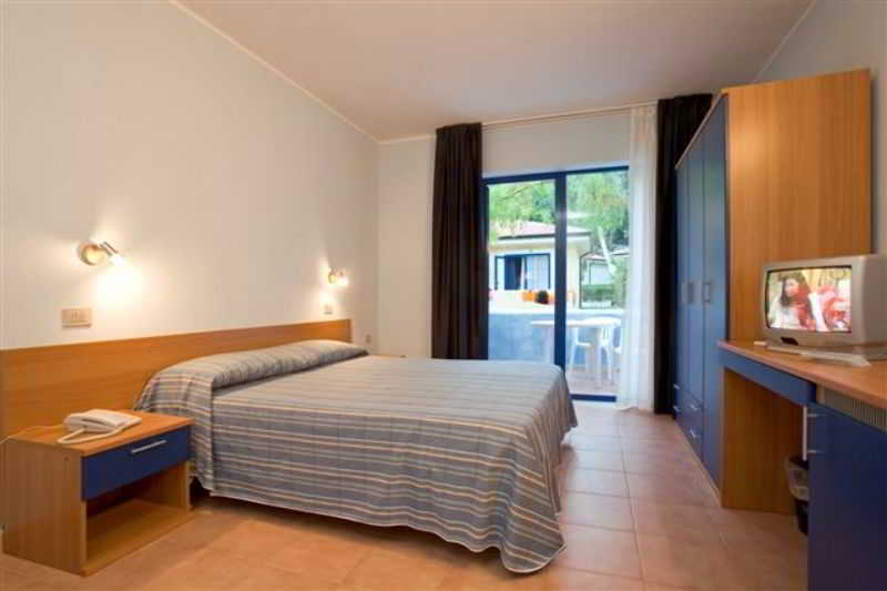 Room
Room
di Villaggio L'Oasi