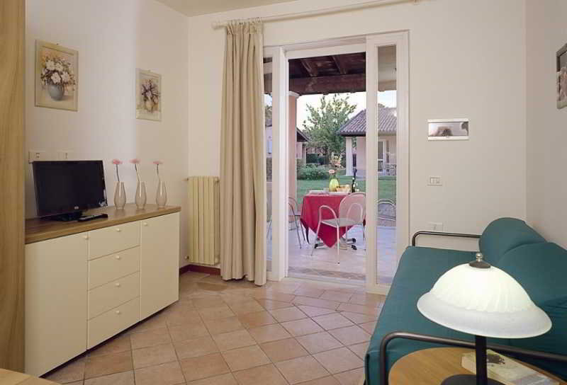 Room
Room
di The Garda Village