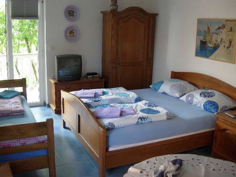 Room
Room
di Apartments Moreta