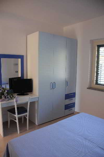 Room
Room
di Villaggio&Residence Club Aquilia