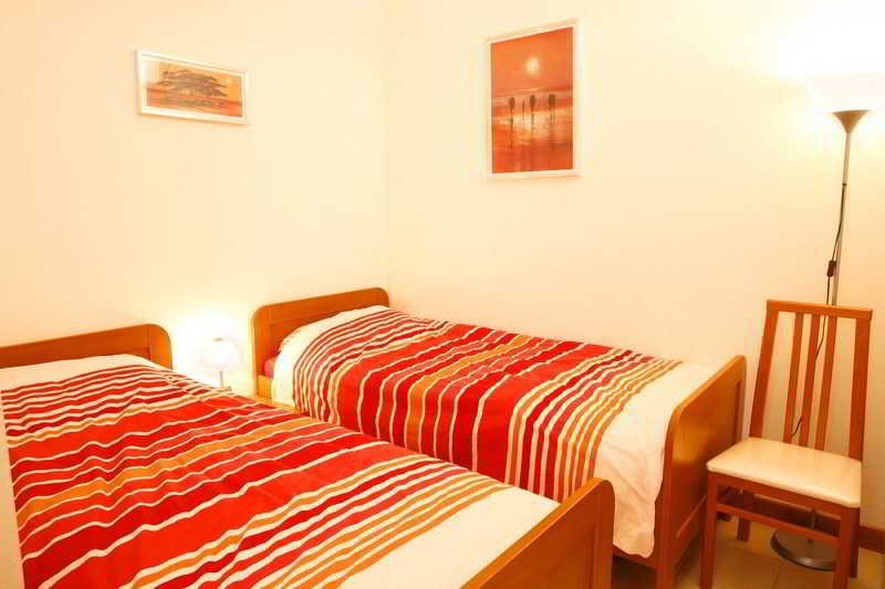 Room
Room
di Residence Porto Letizia