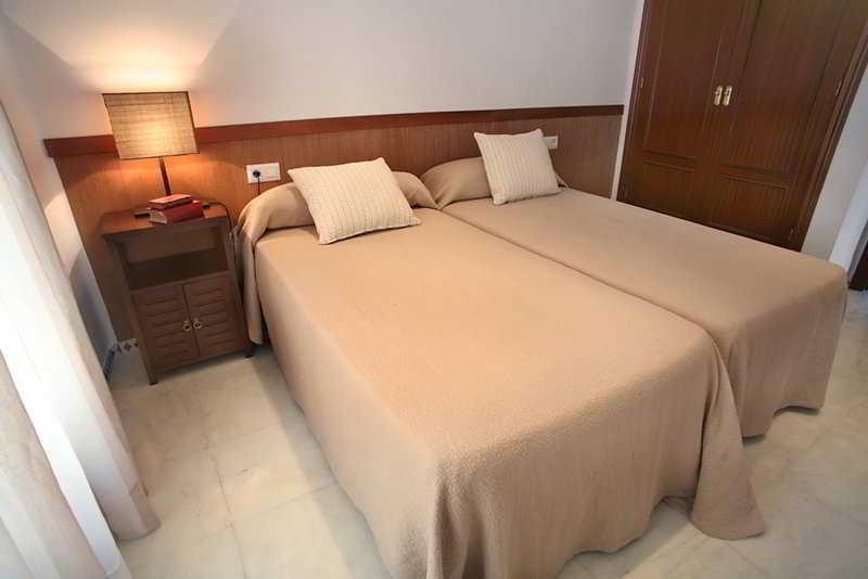 This photo about Apartamentos Patios De Alcantara shared on HyHotel.com