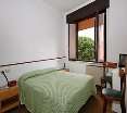 Room
Room
di Hotel Primavera