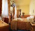 Room
Room
di Hotel & Residence Roma