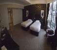 Room
Room
di Queens Hotel
