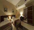 Room
Room
di Governor West Bay Suites & Residences