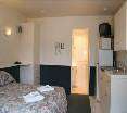 Room
Room
di Auckland North Shore Motels & Holiday Park