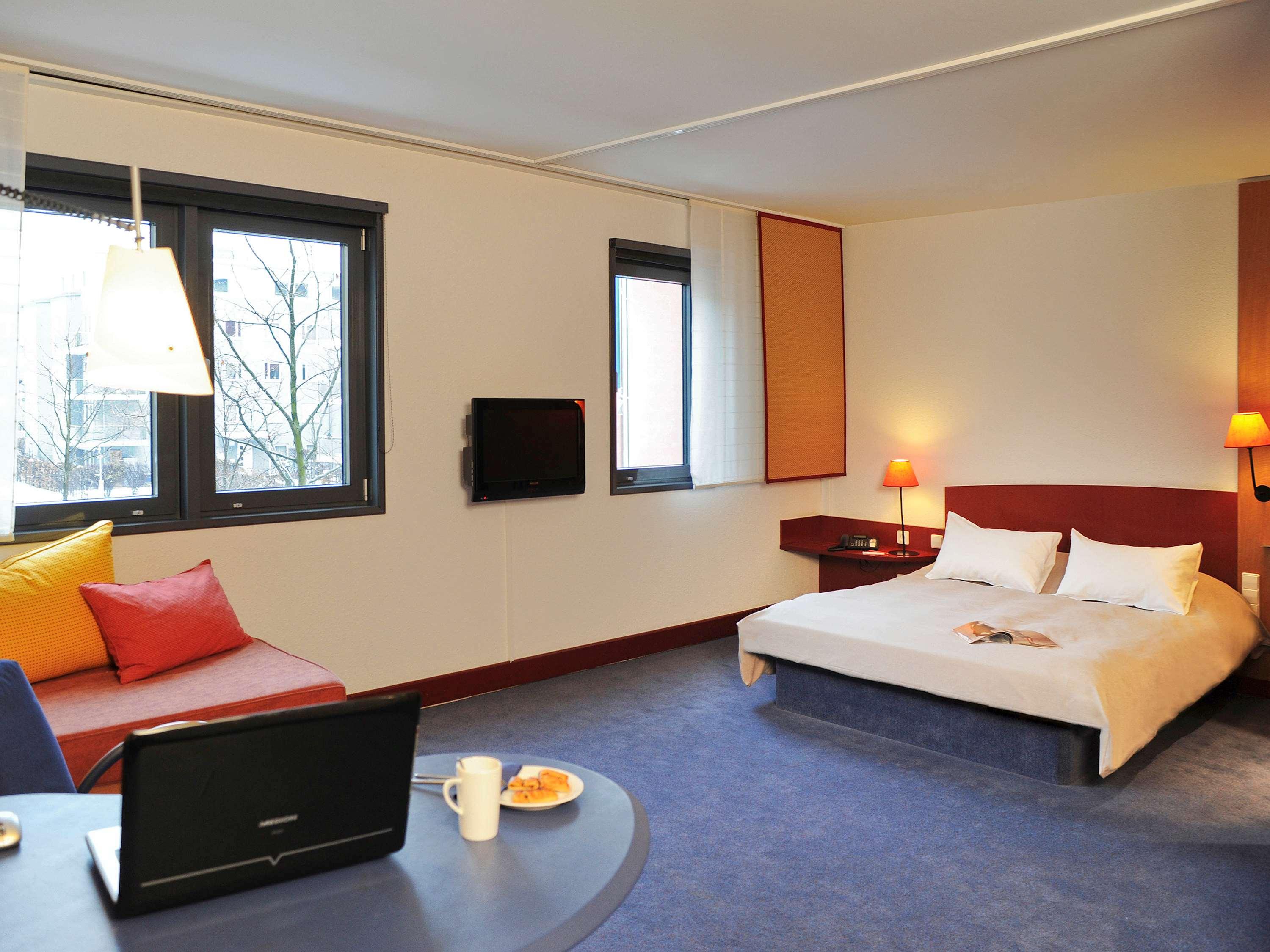 NOVOTEL SUITES MUC SCHWABING - Tap to explore photos