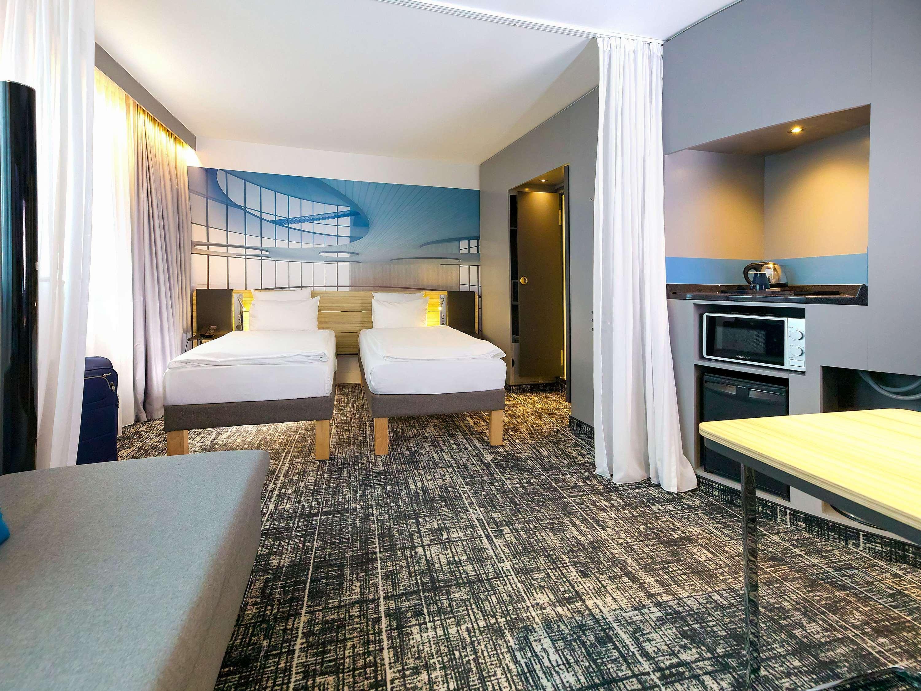 NOVOTEL SUITES BER POTSDAMER PL - Tap to explore photos
