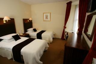 Room
 di New County Hotel