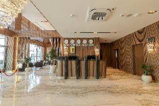 By The Marina Hotel