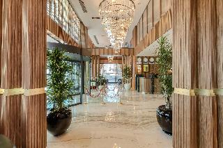 By The Marina Hotel