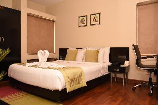 Royal Orchid Golden Suites - Zimmer