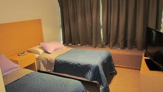 Callao Plaza Suites - Zimmer