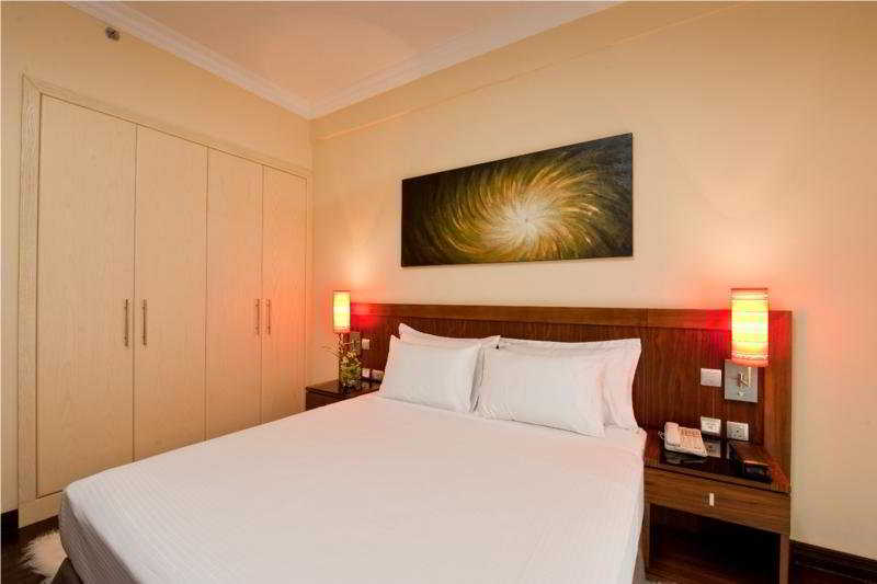 Al Nawras Hotel Apartments - Zimmer