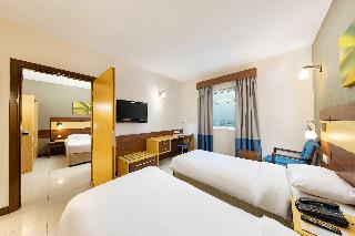 Citymax Sharjah Hotel - Zimmer