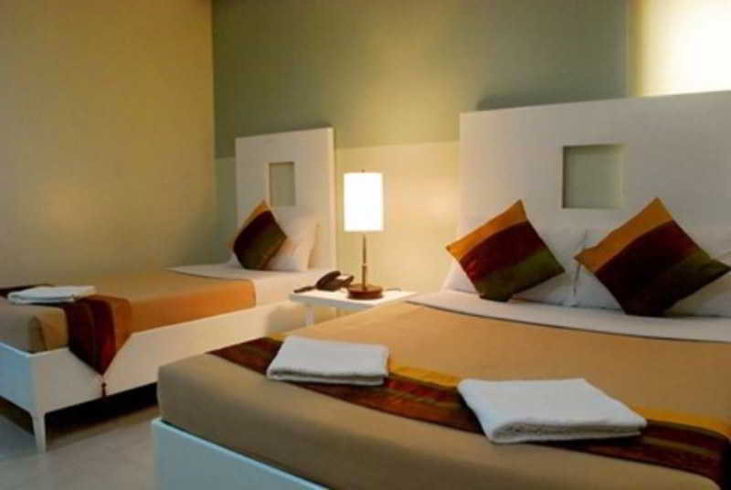 Room
 di Empire Suites Hotel