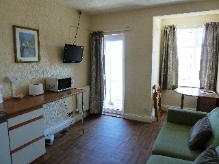 Room
 di Coasters Hotel & Holiday Apartments