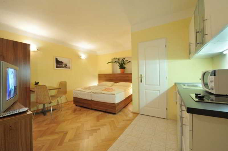 Room
 di U Zlate Podkovy Aparthouse