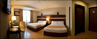 Room
 di The Pinnacle Hotel and Suites