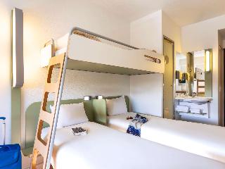 Standard Room with 2 single beds and a bunk bed