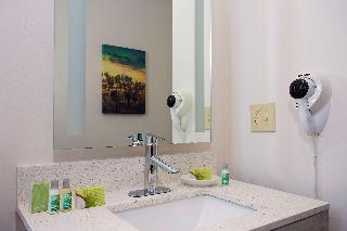 SUITE-1 KING BED,NSMK,COURT,JACZZ,MICRFG,FLATSC,CONTINENTAL BREAKFAST