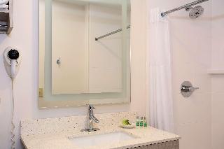 SUITE-1 KING BED,NSMK,COURT,JACZZ,MICRFG,FLATSC,CONTINENTAL BREAKFAST