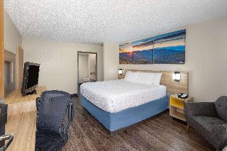 1 King Bed Mobility Accessible Room Smoking