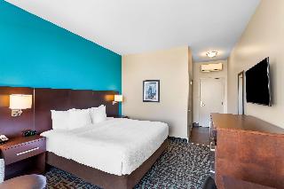 1 King Bed, Non-Smoking, Pillow Top Mattress, Flat Screen Television, Refrigerator, Wi-Fi
