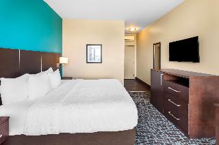 1 King Bed, Non-Smoking, Pillow Top Mattress, Flat Screen Television, Refrigerator, Wi-Fi