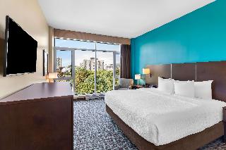 1 King Bed, Non-Smoking, Pillow Top Mattress, Flat Screen Television, Refrigerator, Wi-Fi