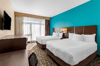 2 Queen Beds, Non-Smoking, Pillow Top Mattress, Flat Screen Television, Refrigerator, Wi-Fi