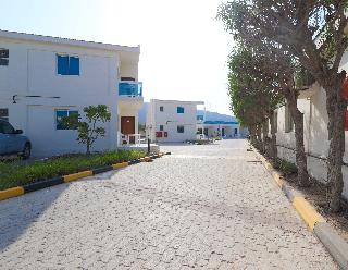 Capital O 224 Holiday Beach Resort