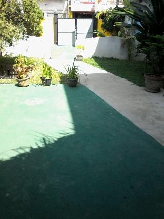 Malika's Yellow House