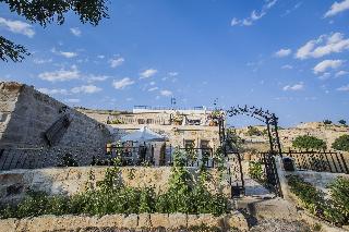 Assiana Cave House