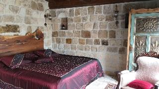 Assiana Cave House
