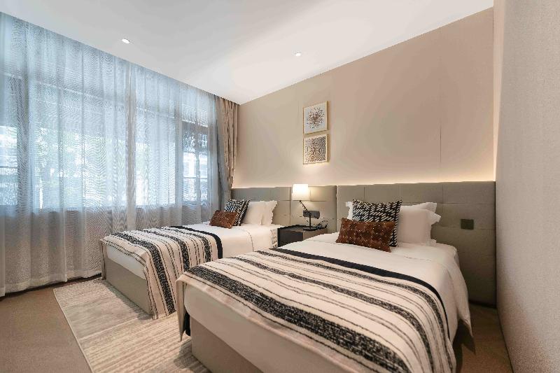 CM+ Serviced Apartment Shenzhen Taige image