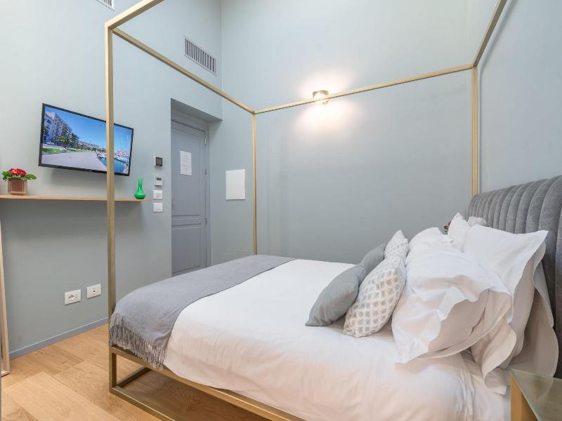 Archã¨ Design Rooms And Suites image
