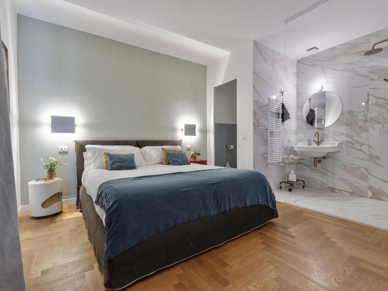 Archã¨ Design Rooms And Suites image