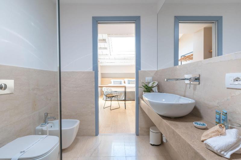 Archã¨ Design Rooms And Suites image