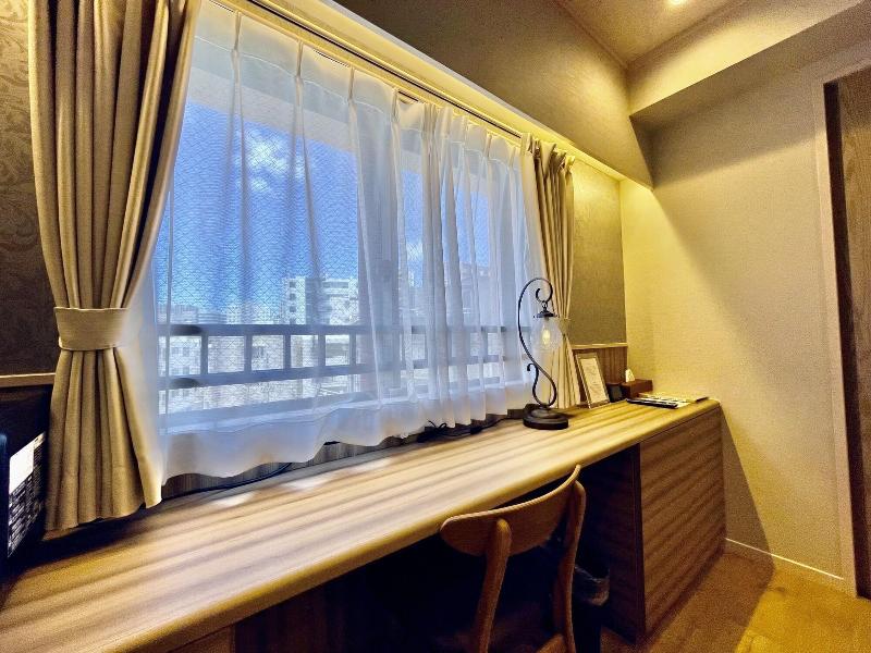 Hotel Tenshi-kan Kumoji image