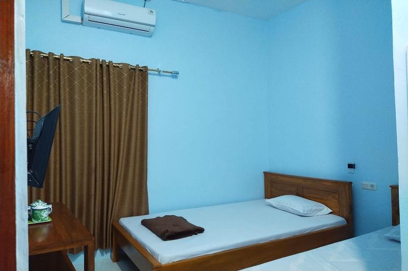 Wisma Kencana Guesthouse By Zuzu 3