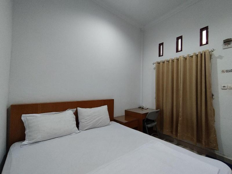 Rich Guesthouse By Zuzu image