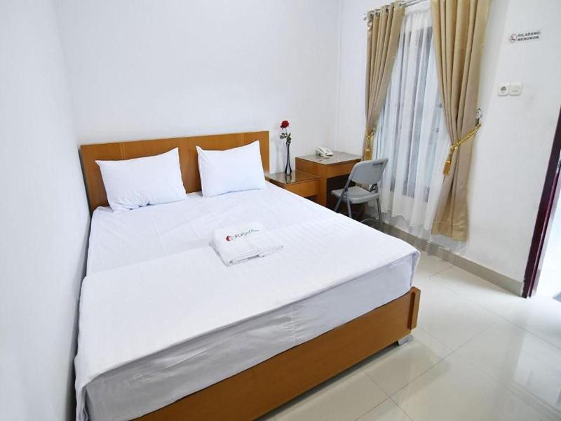 Rich Guesthouse By Zuzu image