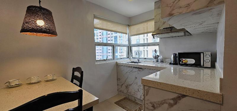 Gilmore Tower Suites By Sms Hospitality image