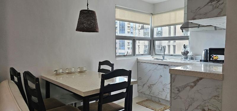 Gilmore Tower Suites By Sms Hospitality image