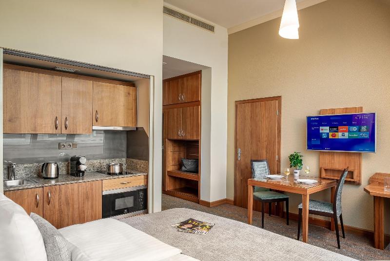 Monarch Apartments By Adrez Living image